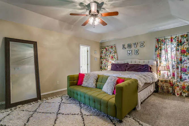 Staged primary bedroom prepared for professional photography on a Johnson County listing